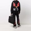 FW21 Melting Arrow Logo Print Sports Herr Svart
